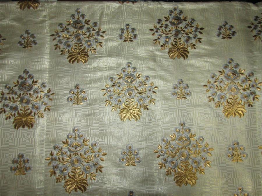 Brocade fabric cream/metallic gold with blue embroidery color 44&quot;wide