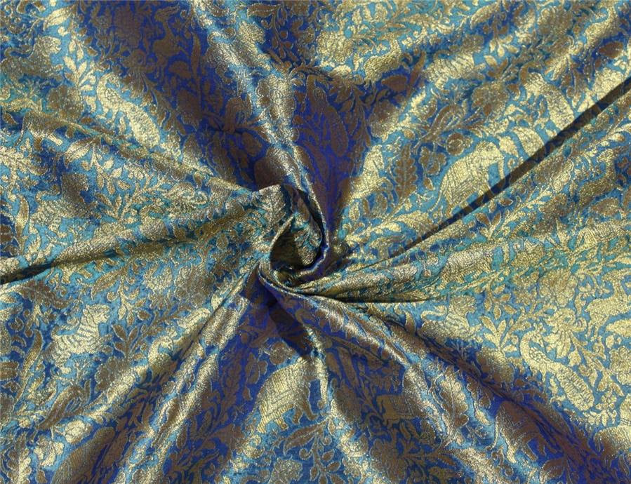 Silk Brocade blue Fabric with metallic Gold Animal Figure Motifs 44&quot;