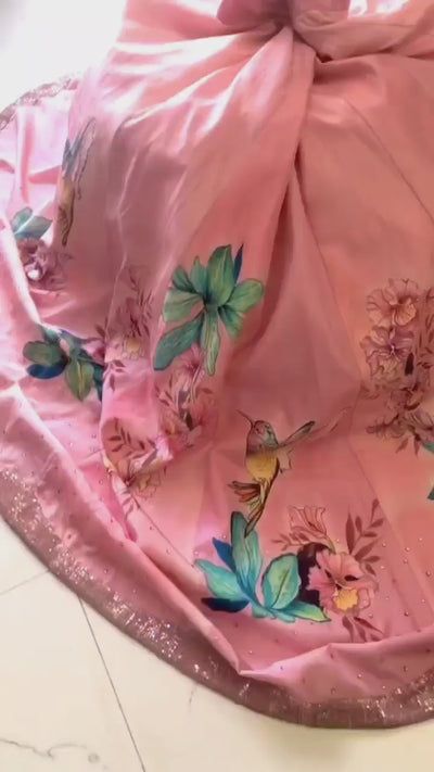 Handpainted unstitched  100% silk lehenga with hibiscus flowers and humming bird on a baby pink background