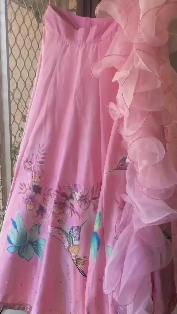Handpainted unstitched  100% silk lehenga with hibiscus flowers and humming bird on a baby pink background